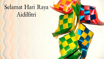 Greeting with malay word "Selamat Hari Raya Aidilfitri" that translates to wishing you a joyous hari raya on ketupat ribbon background. Selected focus. Image flare, soft, bokeh and vintage.