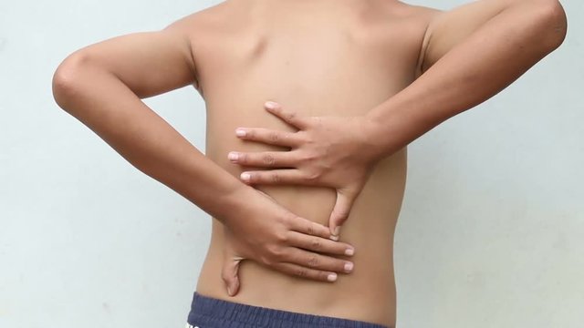 Asian kid with scoliosis