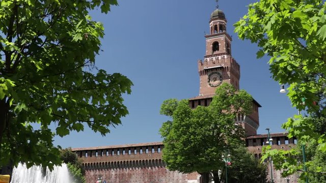 Sforza Castle in Milan. Tower with clock. The tower that overlooks the entrance to the walls of the castle of Milano. 