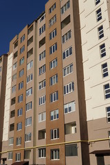 Fototapeta premium Modern condominium building real etate in city with blue sky