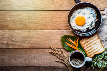  Fried eggs and black coffee at breakfast