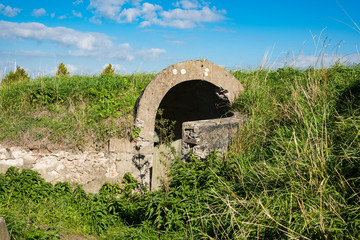 Fototapeta na wymiar bunker in Willemstad, The Netherlands. Against blue sky