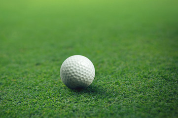 Golf ball on green