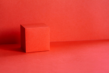 Living coral color cube geometrical figure still life composition. Beautiful three-dimensional...