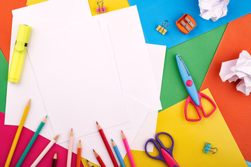 White papers for text on the background with colored cardboards. Preschool craft  kids concept