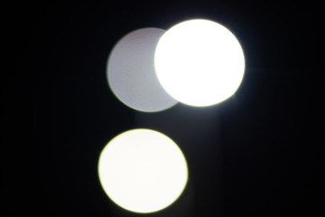 Bokeh on night, abstract background with circles