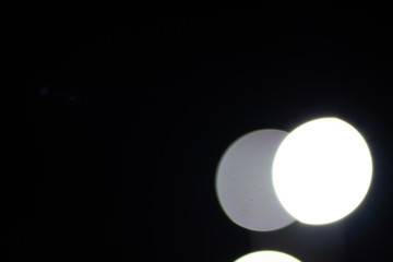 Bokeh on night, abstract background with circles