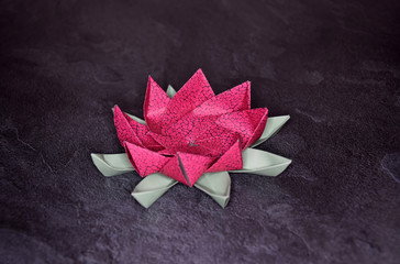 Pink Origami Lotus Flower - Paper Art on Textured Background