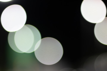 Bokeh on night, abstract background with circles