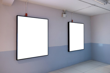 Blank poster board wall in modern shopping mall