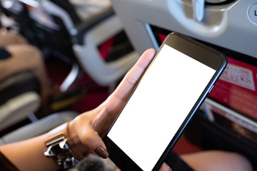 touching and slide mobile phone screen on airplane or aircraft,blank mobile phone screen mock up,selective focus