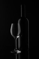 Wine bottle and wineglass