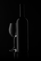 Wine bottle and wineglass