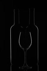 Wine bottle and wineglass