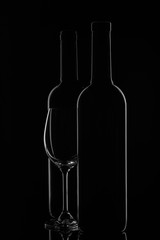 Wine bottle and wineglass
