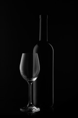 Wine bottle and wineglass