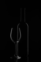 Wine bottle and wineglass