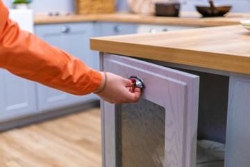 woman chooses the kitchen furniture in the store. furniture store