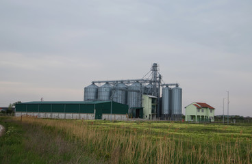 Fototapeta na wymiar Metallic grain tank (Silo) for food storage, in Vojvodina (Serbia)