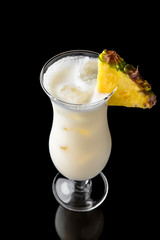 Pina Colada. Alcoholic or non-alcoholic cocktail with orange citrus, pomegranate with the addition of liqueur, vodka, champagne or martini. Cool drink isolated on black background