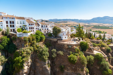 Fototapeta na wymiar Houses on the edge of canyon in Ronda, Andalusia, Spain