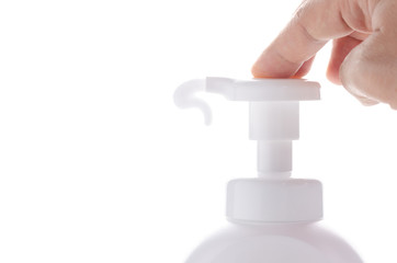 hand press on pump of bottle with bubble splash on white background