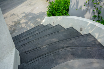curve modern concrete stairs with non-slip line pattern