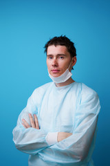 Surgeon in sterile blue uniform