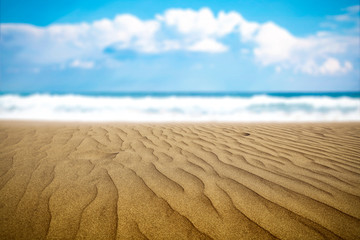 Fototapeta na wymiar Sand background and ocean 
