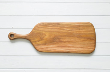 Kitchen cutting wooden  board on a white background.  Top view. 