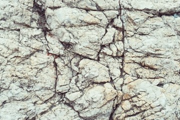 Old Dirty Stone Cracked Rock Surface Overlay Texture. Natural Grunge Rough Damaged Ancient Background.