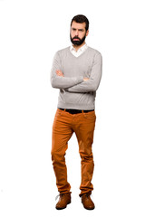 Naklejka premium Handsome man with sad and depressed expression over isolated white background