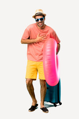 Full body of Man with hat and sunglasses on his summer vacation