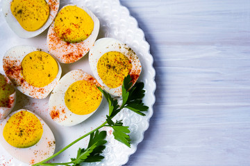 Boiled eggs on a plate top view