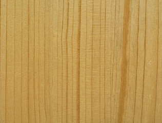 Close up detail of pine wood. Texture, background. Vertical grain lines.