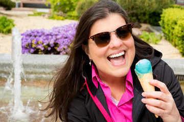 Lady enjoys her ice cream outdoors