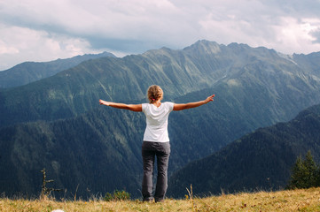 Fototapeta na wymiar Travel woman standing on mountain in Svaneti in Georgia