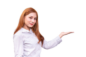 cheerful Asian woman presenting an empty copy space on the open hand palm isolated on white background with clipping path, advertising presentation for product. side view