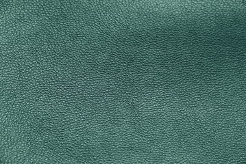 Texture of genuine leather. Shades of background blue, gray, green.