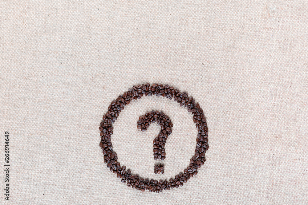 Fototapete question symbol in circle from coffee beans on linen texture, aligned bottom center.