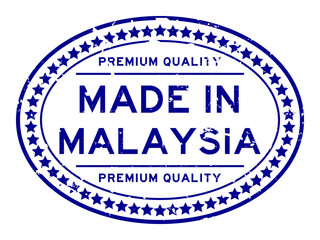 Grunge blue premiumq quality made in Malaysia oval rubber seal business stamp on white background