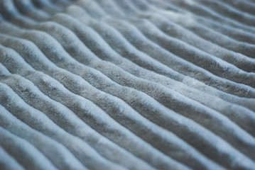 Fototapeta na wymiar Fluffy Gentle baby gray minky fabric with stripes.