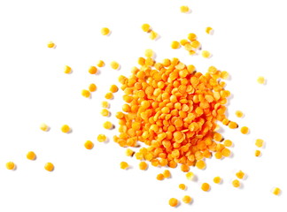 Pile red lentils isolated on white background, top view and clipping path