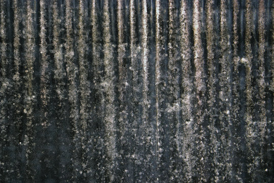 grey rusty oxidian metal iron plate grunge wall background backdrop wallpaper © Ampalyze