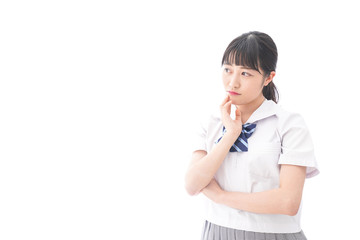 考える女子学生