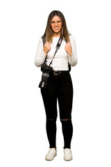 Full body of Young photographer woman frustrated by a bad situation