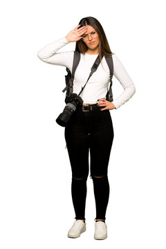 Full body of Young photographer woman with tired and sick expression