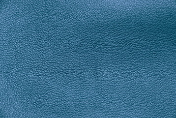  Texture of genuine leather. Tint background blue.