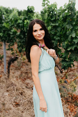 Portrait of a beautiful bride in a turquoise dress.