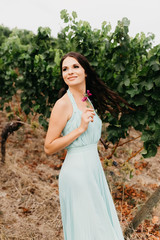 Portrait of a beautiful bride in a turquoise dress.